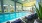 a swimming pool with chairs around it