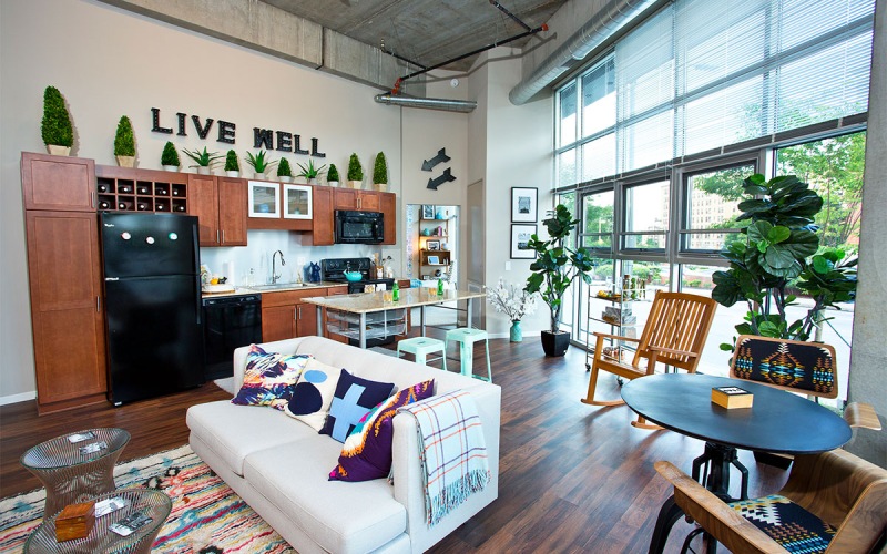 a large living room with a large window