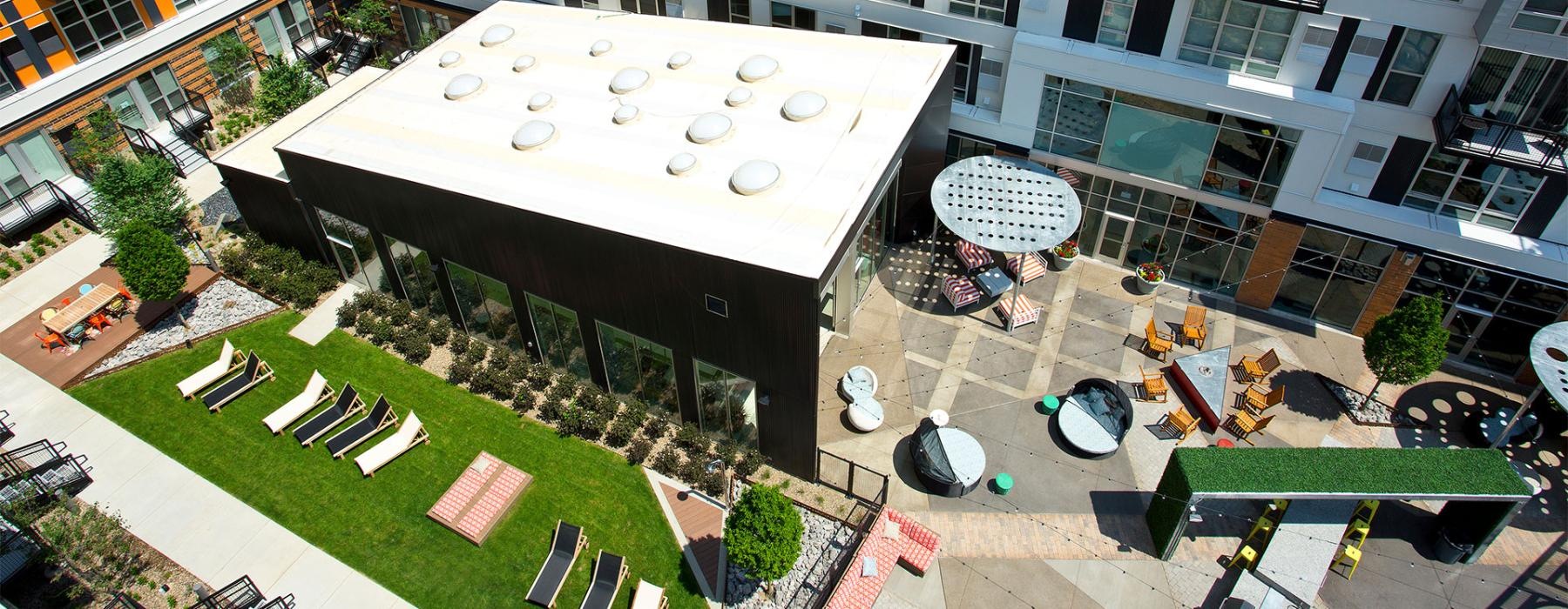 a building with a courtyard and a pool