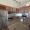 kitchen with ample counter-space, modern appliances and bright lighting
